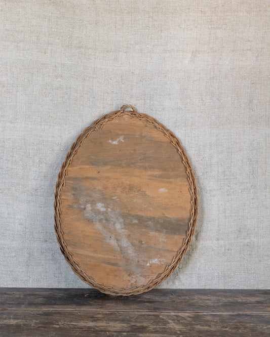 Le miroir en rotin