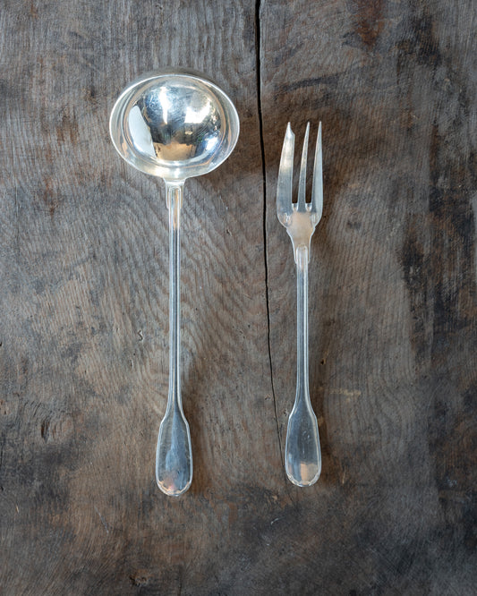 La louche à crème et la fourchette à gâteau