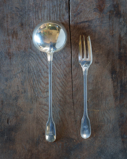 La louche à crème et la fourchette à gâteau