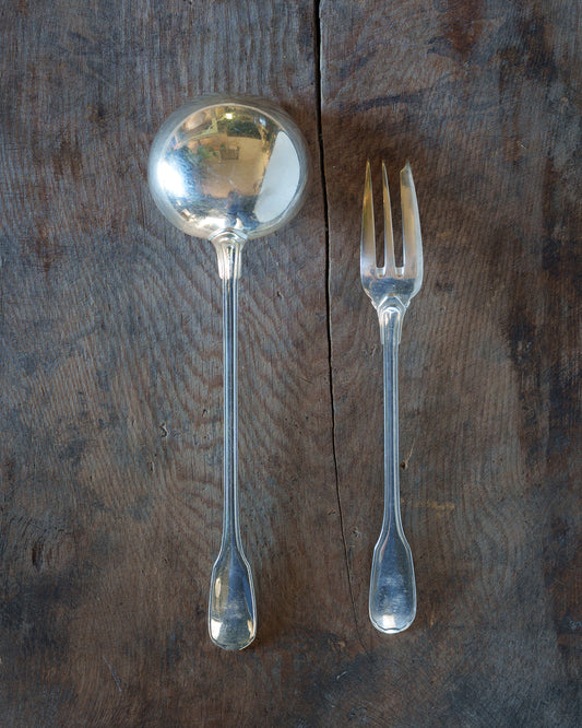 La louche à crème et la fourchette à gâteau